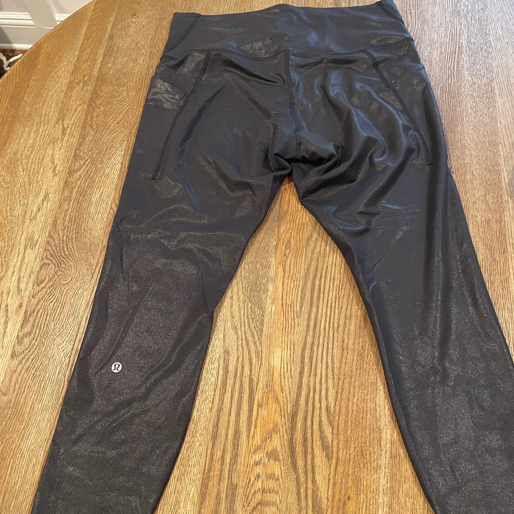 Lululemon Wunder Train 25” w/pockets black foil sz14